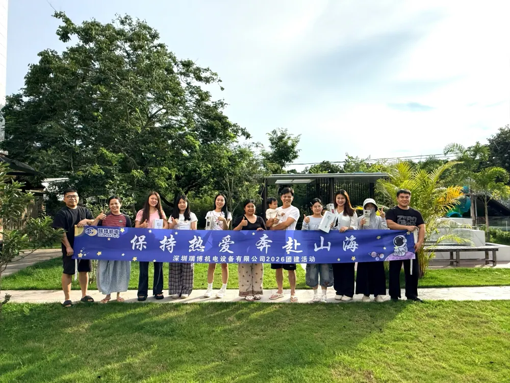 The full group holding the original Ruibo Mechatronics 2026 team-building banner